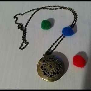 Beautiful hollow aromatherapy oil / perfume necklace about 16 -18" long